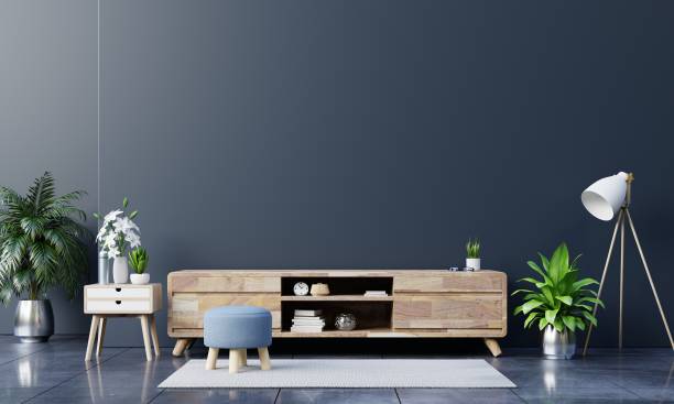istock Tv cabinet in modern empty room on dark wall,minimal designs. 1254900173