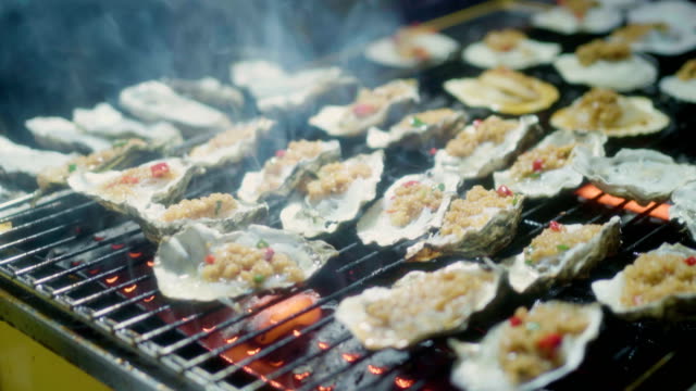 Roast oysters at night market