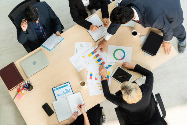 istock Business people group meeting shot from top view 1254912359