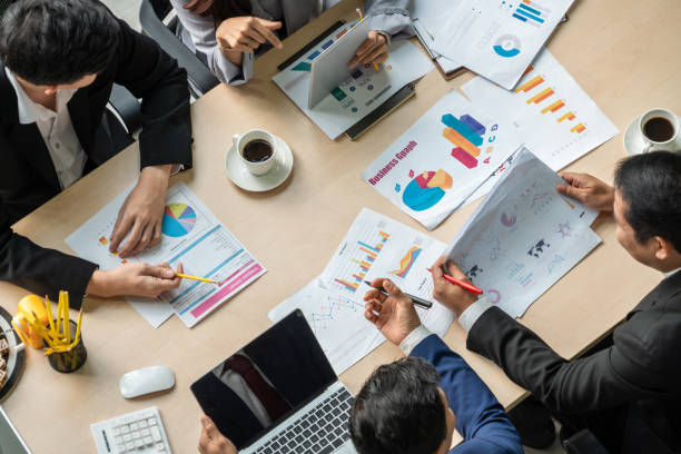 istock Business people group meeting shot from top view 1254914528