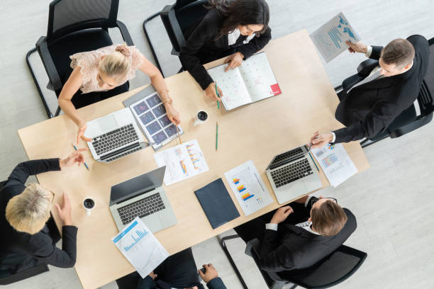 istock Business people group meeting shot from top view 1254916658