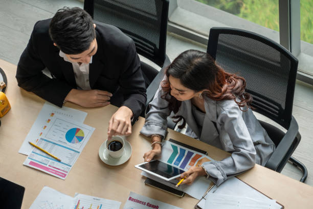 istock Business people group meeting shot from top view 1254918321
