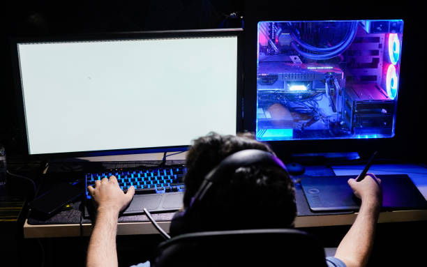 istock colorful computer workstation and keyboard used by bearded male designer freelancer illustrator 1254924442