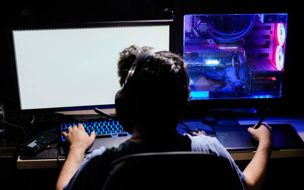 istock colorful computer workstation and keyboard used by bearded male designer freelancer illustrator 1254925037