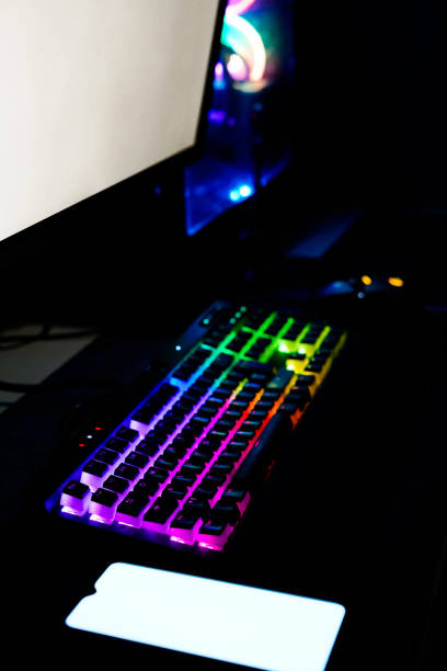 istock colorful rainbow rgb gaming and workstation high end computer and smart phone 1254926705