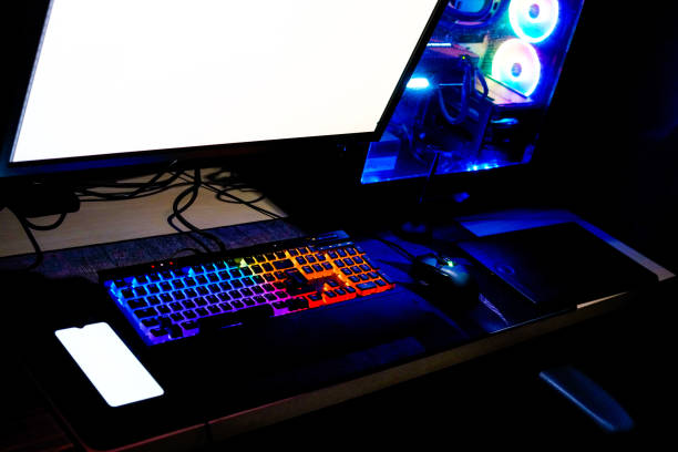 istock colorful rainbow rgb gaming and workstation high end computer and smart phone 1254926726