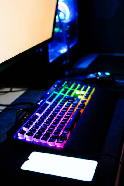 istock colorful rainbow rgb gaming and workstation high end computer and smart phone 1254926749