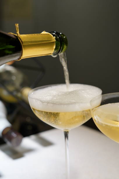 Champagne pouring into the glass