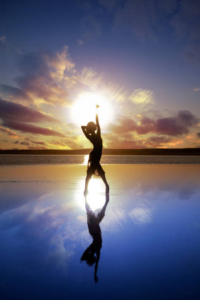 istock Ballerina dancing on the lake 1254938982