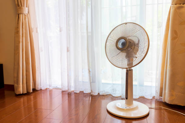 istock Fan placed near the window 1254940566