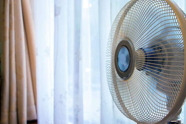 istock Fan placed near the window 1254940579