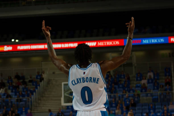istock Basketball player with arms raised 1254941234