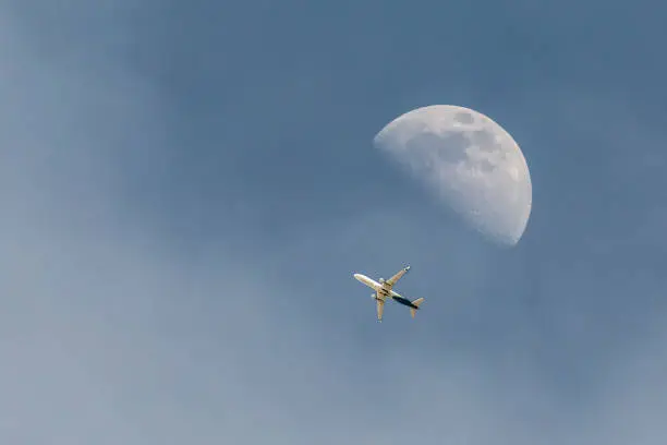 Photo of First Quarter Moon and Clouds