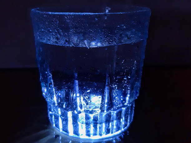 istock Illuminated Glass of Water 1254942539
