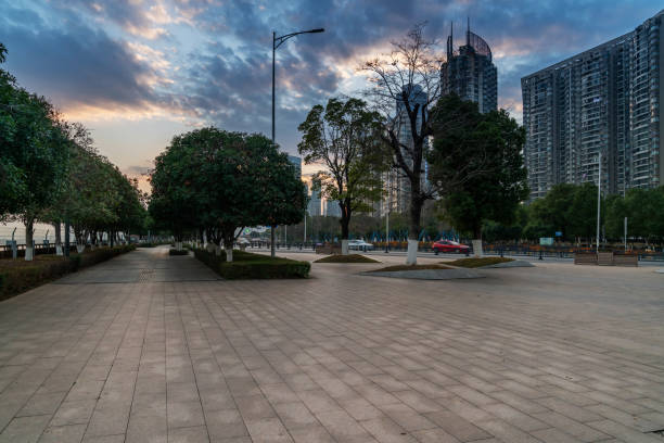 istock empty, modern square and skyscrapers in modern city 1254943581