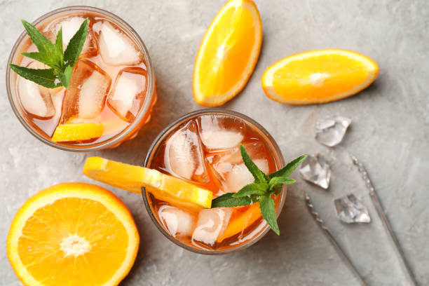 istock Composition with Spritz cocktail on gray background. Summer drink 1254945281