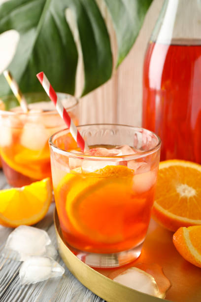 istock Composition with Spritz cocktail on wooden background. Summer drink 1254945454