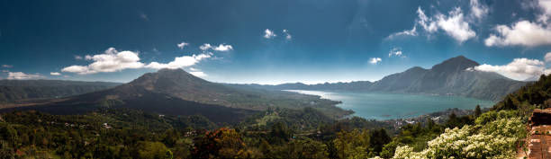 istock Volcano and lake Batur. Bali, Indonesia. 1254947982