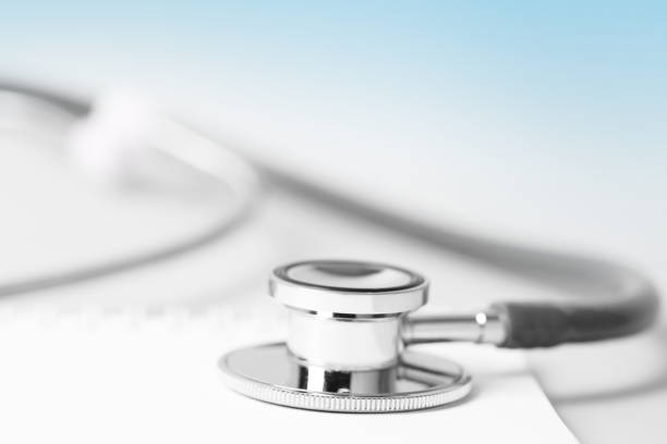 istock Medical concept - stethoscope with a spiral notebook 1254948258