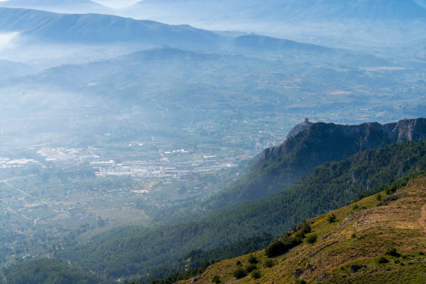 istock Sunrise views from the Montcabrer mountain with Cocentaina castle at right, Cocentaina. 1254949138