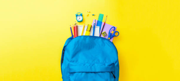 istock School bag. Backpack with supplies 1254949476