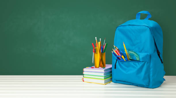 istock School bag with supplies for school 1254949490