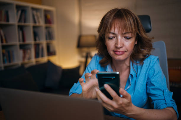 istock Woman works from home late at night 1254949539
