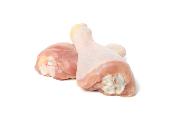 istock Raw chicken meat isolated on white background 1254949866