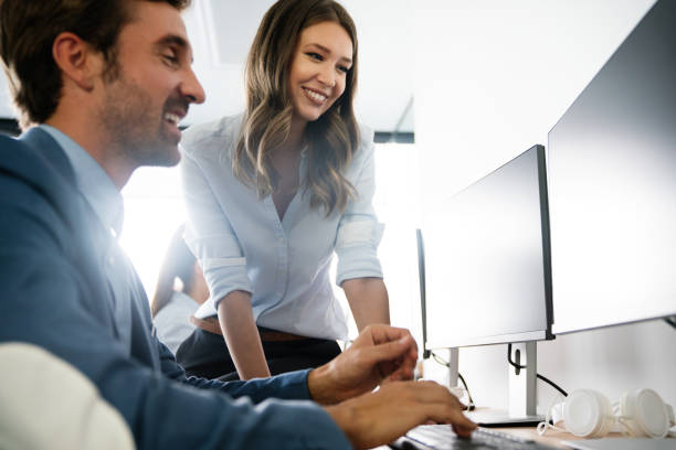 istock Group of multiethnic business people working at busy modern office 1254950959
