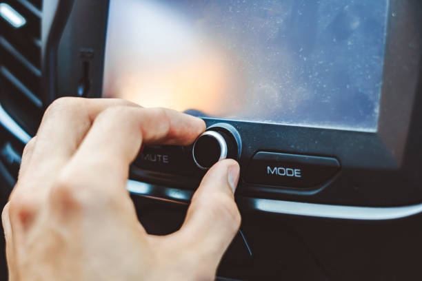 istock hand on the regulator in the car interior 1254951006