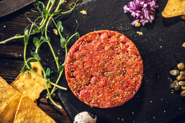 istock Tasty Beef tartare with nachos 1254951022