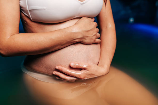 istock Pregnant woman relaxing alternative therapy 1254951123