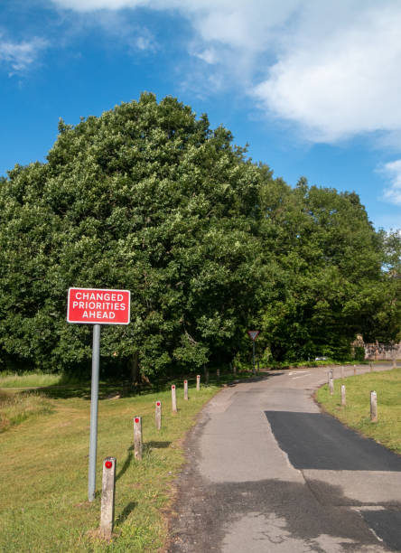 istock Changed Priorities Ahead Sign in Southborough, England 1254953000