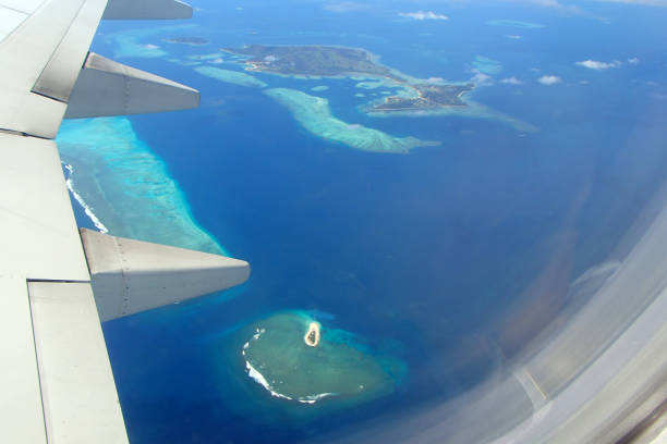 istock Fiji island, porthole and wing plane 1254954514