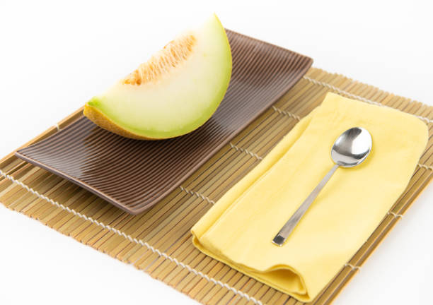 melon lies on a black background