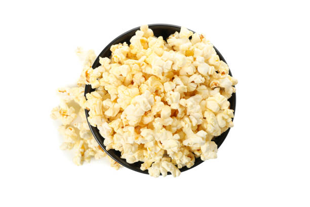 istock Bowl with tasty popcorn isolated on white background 1254957397