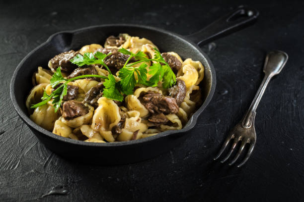 istock Italian pasta shells with beef sauce. 1254957583