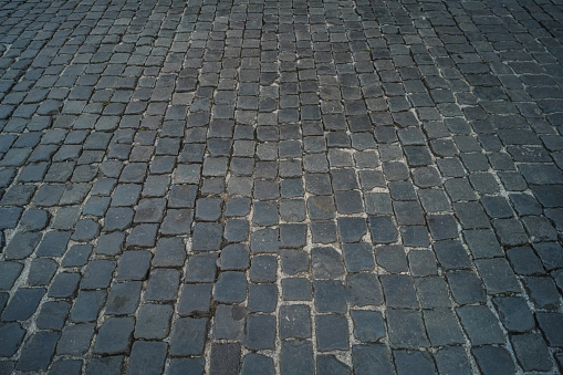 Cobblestones of Rome abstract pattern in wide picture