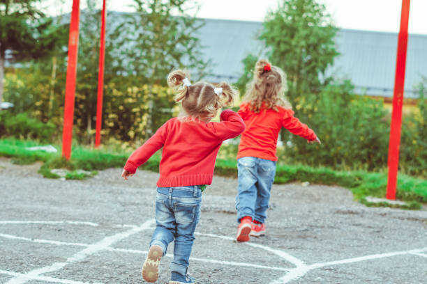 istock children play on the Playground 1254959573