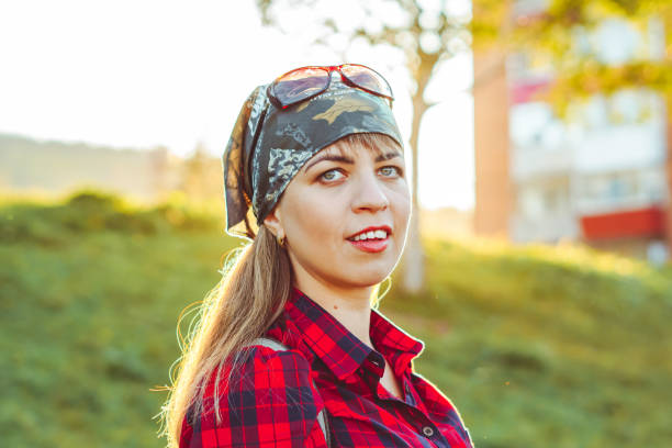 istock girl in a bandana at sunset 1254959844