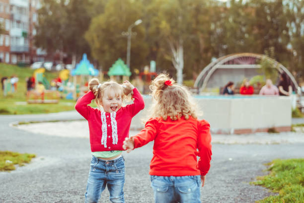 istock children play on the Playground 1254960107