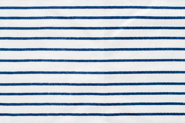 istock Blue and white stripes on the knitted fabric 1254961174