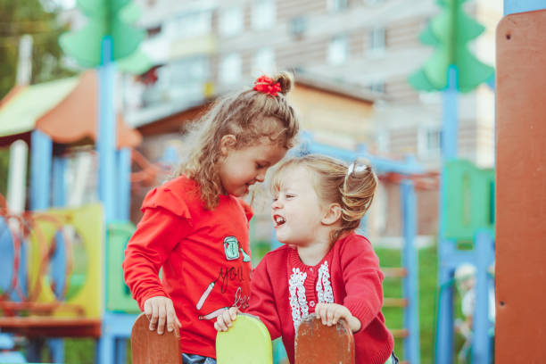 istock children play on the Playground 1254961350