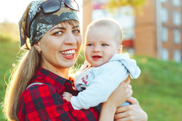 istock mother with a baby in her arms 1254961406