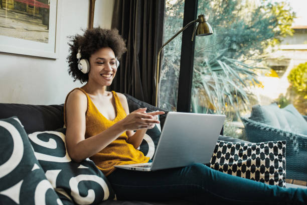 istock A woman discusses work with colleagues via video call 1254964046