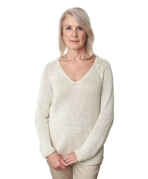 istock casual mature woman while standing against white background 1254964769