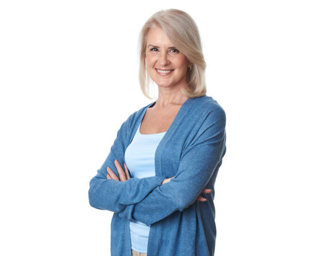 istock Confident smiling beautiful aged woman isolated on white 1254967786
