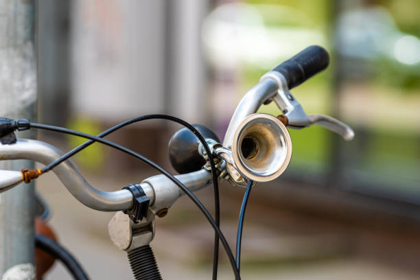 Close-up of a Vintage bicycle horn on handlebar, defocused background
