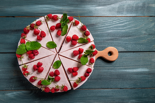 Cheesecake with raspberries and mint, no baked cheesecake raspberry, berries, cake, banner menu recipe place for text, top view.