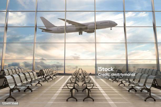 Empty Airport Terminal Lounge With Airplane On Background Stock Photo - Download Image Now
